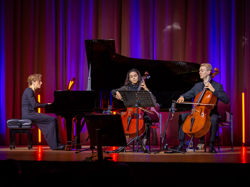 three musicians on stage